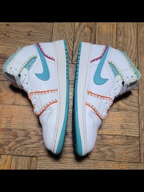Nike Kids' White High-Top Sneakers with Teal Swoosh